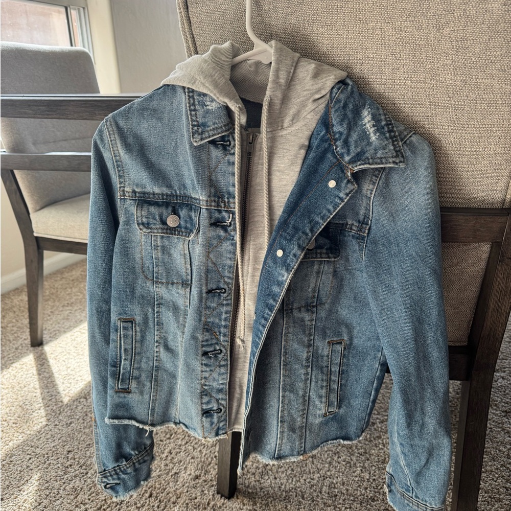 Jean Jacket with built in zip up/ hoodie. Purchased from Tilly's. Size Small.